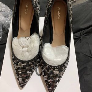 Aldo cheetah print shoes size 7.